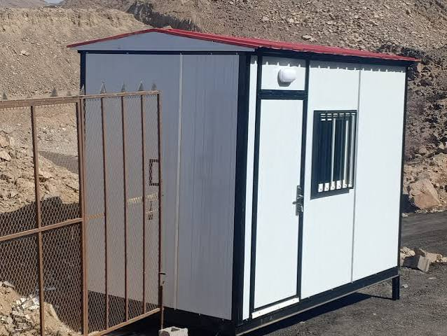 Portable cabin loaded on a flatbed truck in Saudi Arabia