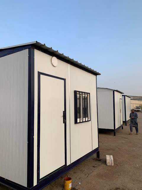 Crane lifting a portable cabin onto site in Saudi Arabia